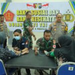 Sinergitas Polres Mojokerto dan Kodim 0815 Berikan Layanan Pengobatan Gratis Untuk Warga